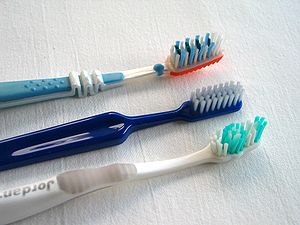 Three toothbrushes, photo taken in Sweden